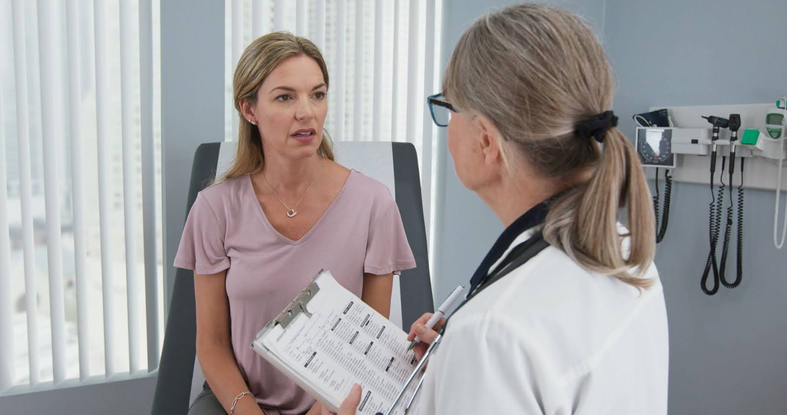 A woman talking to her doctor.