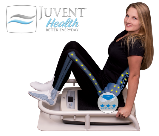 Woman sitting and using compact workout stand with Juvent Micro-Impact Platform