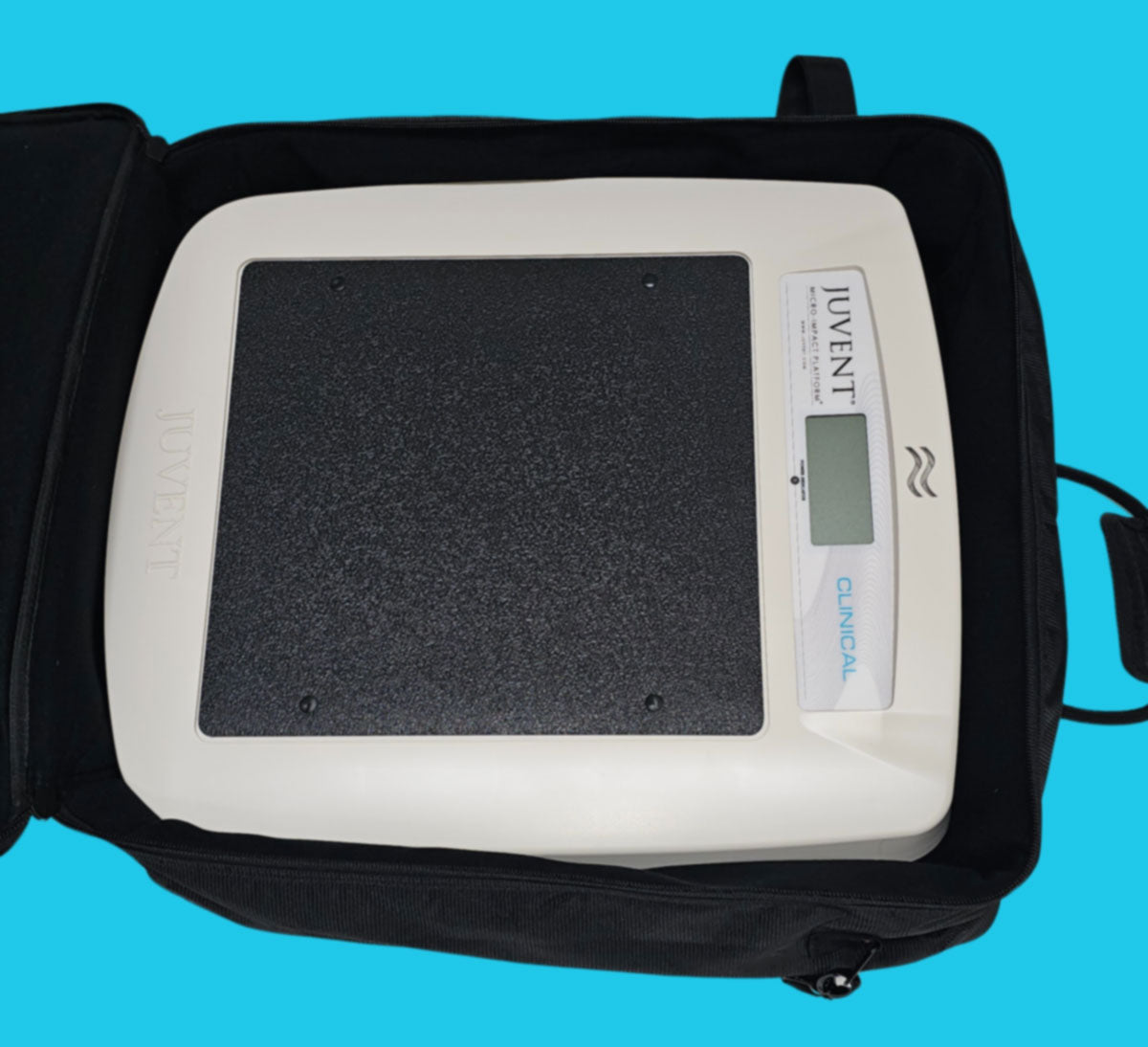 Juvent micro-impact platform inside the sturdy nylon carrying bag.