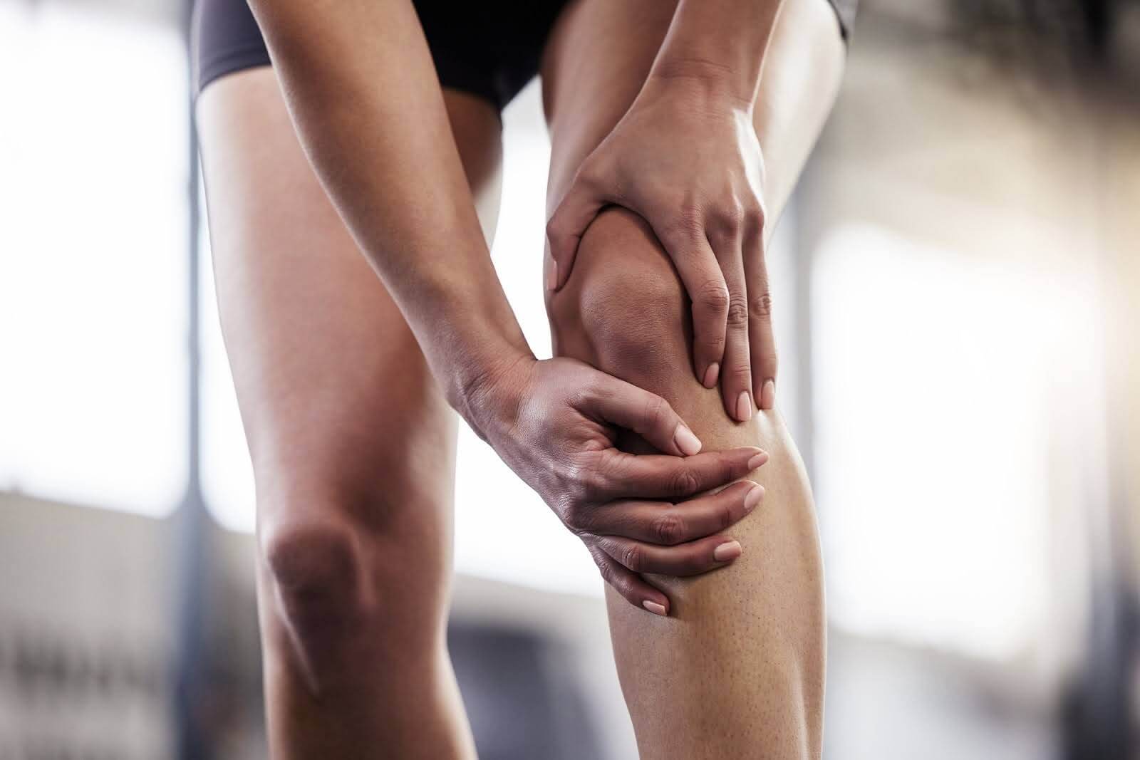A woman with joint pain.